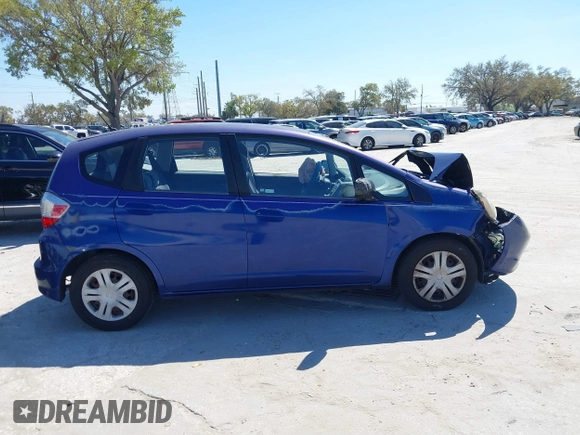 2009 Honda Fit with VIN JHMGE88249S056575, listed as a IAAI auction lot 41702555 with 116,658 mi miles. Bid and sale history available at carsss.com. Image 13.