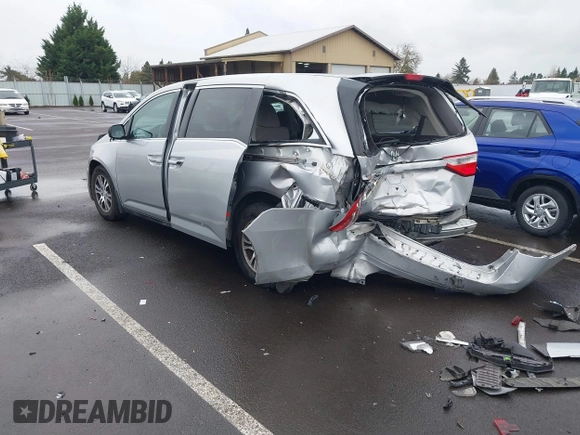 2012 Honda Odyssey EX with VIN 5FNRL5H46CB016065, listed as a IAAI auction lot 41849195 with 125,400 mi miles and . Bid and sale history available at DreamBid. Image 3.