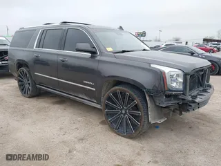 2016 GMC Yukon XL Denali with VIN 1GKS1HKJ7GR186012, listed as a IAAI auction lot 41473177 with 156,280 mi miles. Bid and sale history available at carsss.com. Image 1.
