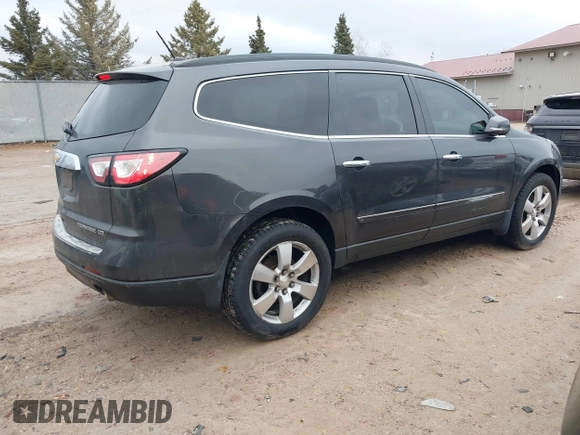 2015 Chevrolet Traverse LTZ with VIN 1GNKVJKD5FJ341677, listed as a IAAI auction lot 41632340 with 173,711 mi miles and . Bid and sale history available at DreamBid. Image 4.