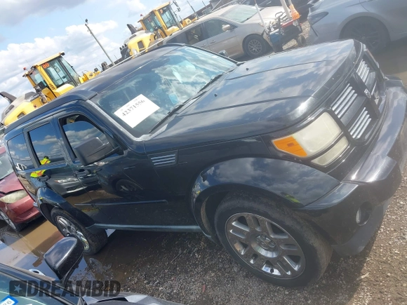 2011 Dodge Nitro Heat with VIN 1D4PT4GK7BW602014, listed as a IAAI auction lot 42371556 with 143,986 mi miles and . Bid and sale history available at DreamBid. Image 13.