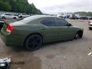 2010 Dodge Charger Police z VIN 2B3CA4CT7AH245139, wystawiony jako Copart lot #54257155 z przebiegiem 219 135 mil mil oraz Czysty tytuł • Clean title. Historia ofert i sprzedaży dostępna na DreamBid. Obrazek 3.