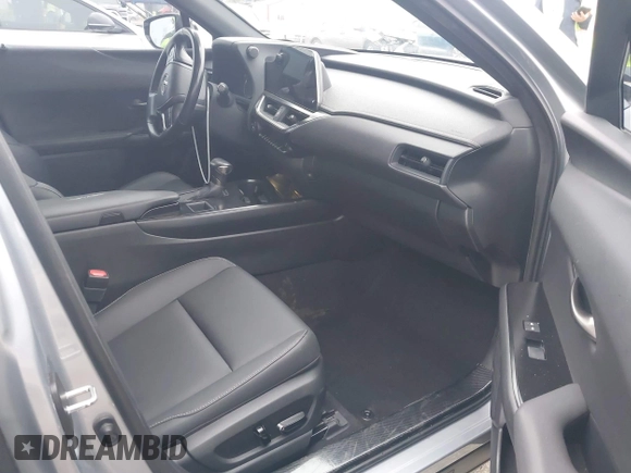 2023 Lexus UX 250h with VIN JTHX6JBH6P2143926, listed as a IAAI auction lot 42180779 with 65,106 mi miles and . Bid and sale history available at DreamBid. Image 5.