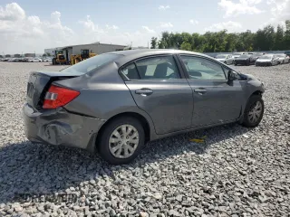 2012 Honda Civic LX z VIN 19XFB2F54CE379485, wystawiony jako Copart lot #60303675 z przebiegiem 156 462 mil mil oraz Czysty tytuł • Clean title. Historia ofert i sprzedaży dostępna na DreamBid. Obrazek 3.