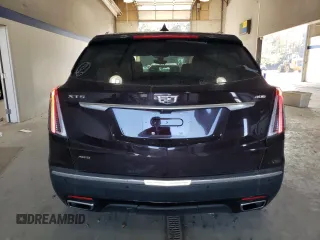 2021 Cadillac XT5 AWD Sport z VIN 1GYKNGRS5MZ165836, wystawiony jako Copart lot #77872264 z przebiegiem 46 065 mil mil oraz Szkoda całkowita • Salvage title. Historia ofert i sprzedaży dostępna na DreamBid. Obrazek 6.
