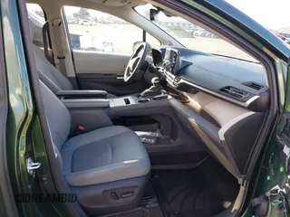 2024 Toyota Sienna XLE with VIN 5TDJSKFC7RS135935, listed as a IAAI auction lot 41409630 with 5,477 mi miles and . Bid and sale history available at DreamBid. Image 5.