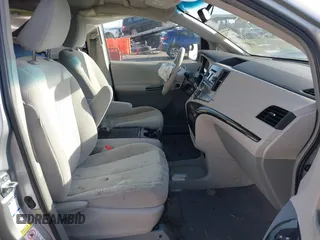 2014 Toyota Sienna LE with VIN 5TDJK3DC4ES088768, listed as a IAAI auction lot 41473251 with 100,512 mi miles and . Bid and sale history available at DreamBid. Image 5.