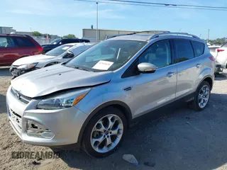 2016 Ford Escape Titanium with VIN 1FMCU0J94GUB11776, listed as a IAAI auction lot 41945655 with 119,949 mi miles. Bid and sale history available at carsss.com. Image 17.