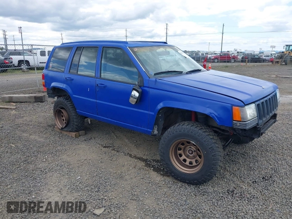 1996 Jeep Grand Cherokee Laredo with VIN 1J4GZ58YXTC329037, listed as a IAAI auction lot 42051175 with 314,571 mi miles and . Bid and sale history available at DreamBid. Image 1.