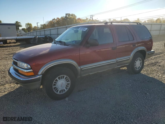 1999 Chevrolet Blazer LS with VIN 1GNDT13WXX2119758, listed as a Copart auction lot 76240964 with 162,369 mi miles and Salvage Title. Bid and sale history available at carsss.com. Image 1.