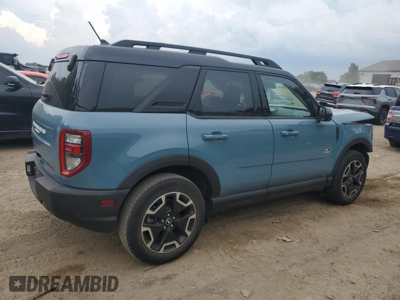 2022 Ford Bronco Sport Outer Banks z VIN 3FMCR9C61NRD00690, wystawiony jako Copart lot #61822235 z przebiegiem 10 635 mil mil oraz Czysty tytuł • Clean title. Historia ofert i sprzedaży dostępna na DreamBid. Obrazek 3.