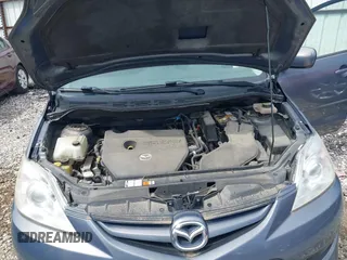 2009 Mazda 5 Touring with VIN JM1CR29LX90333914, listed as a IAAI auction lot 42101304 with 129,470 mi miles. Bid and sale history available at carsss.com. Image 10.