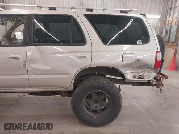 1998 Toyota 4Runner SR5 with VIN JT3HN86R1W0180174, listed as a IAAI auction lot 42065817 with 252,961 mi miles and . Bid and sale history available at DreamBid. Image 6.