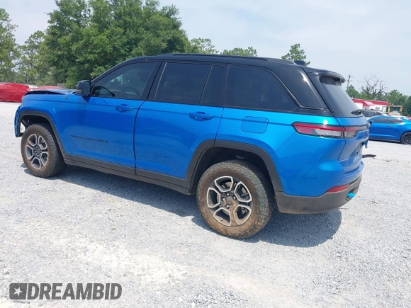 2022 Jeep Grand Cherokee Trailhawk with VIN 1C4RJYC68N8759961, listed as a IAAI auction lot 42589997 with 28,429 mi miles and . Bid and sale history available at DreamBid. Image 3.