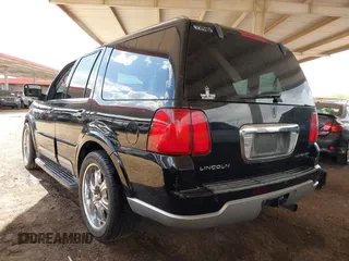 2004 Lincoln Navigator Luxury with VIN 5LMFU27R04LJ16634, listed as a IAAI auction lot 41922950 with 125,080 mi miles. Bid and sale history available at carsss.com. Image 3.