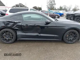 2018 Ford Mustang EcoBoost z VIN 1FA6P8TH3J5129088, wystawiony jako IAAI lot #41792548 z przebiegiem 55 991 mil mil oraz . Historia ofert i sprzedaży dostępna na DreamBid. Obrazek 13.