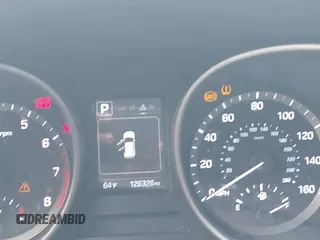 2017 Hyundai Santa Fe 2.4L z VIN 5XYZU3LB7HG418300, wystawiony jako IAAI lot #42369329 z przebiegiem 126 326 mil mil oraz . Historia ofert i sprzedaży dostępna na DreamBid. Obrazek 7.