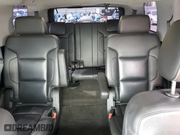 2018 Chevrolet Tahoe Premier with VIN 1GNSKCKC6JR195246, listed as a Copart auction lot 54887165 with 135,973 mi miles and Salvage title. Bid and sale history available at DreamBid. Image 10.