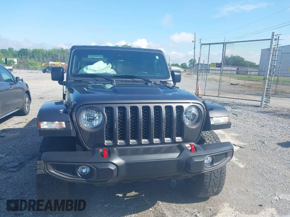 2021 Jeep Gladiator Rubicon z VIN 1C6JJTBG9ML592538, wystawiony jako IAAI lot #42206035 z przebiegiem 37 945 mil mil oraz . Historia ofert i sprzedaży dostępna na DreamBid. Obrazek 12.