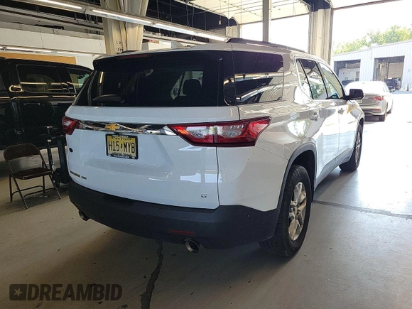2020 Chevrolet Traverse LT Cloth z VIN 1GNEVMKW4LJ292564, wystawiony jako IAAI lot #42866891 z przebiegiem 72 750 mil mil oraz . Historia ofert i sprzedaży dostępna na DreamBid. Obrazek 20.