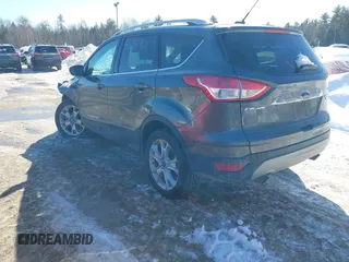 2015 Ford Escape Titanium with VIN 1FMCU9JX6FUB86304, listed as a IAAI auction lot 41595761 with 104,317 mi miles and . Bid and sale history available at DreamBid. Image 3.