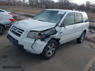 2006 Honda Pilot EX-L with VIN 2HKYF18576H517590, listed as a IAAI auction lot 41802601 with 233,833 mi miles. Bid and sale history available at carsss.com. Image 2.