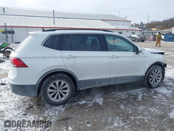 2019 Volkswagen Tiguan SE with VIN 3VV3B7AX7KM040136, listed as a IAAI auction lot 41397714 with 82,302 mi miles and . Bid and sale history available at DreamBid. Image 14.