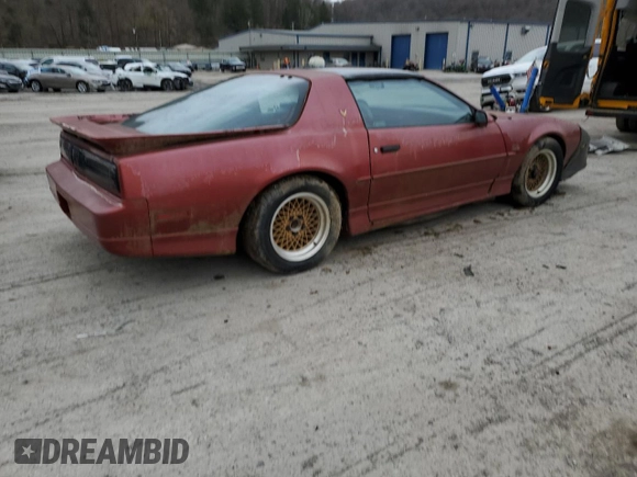 1989 Pontiac Firebird z VIN 1G2FW2181KL244335, wystawiony jako Copart lot #51469365 z przebiegiem 150 615 mil mil oraz Czysty tytuł • Clean title. Historia ofert i sprzedaży dostępna na DreamBid. Obrazek 3.