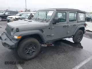 2022 Jeep Wrangler Unlimited High Tide with VIN 1C4HJXDG8NW126143, listed as a IAAI auction lot 41507703 with 44,472 mi miles and . Bid and sale history available at DreamBid. Image 2.