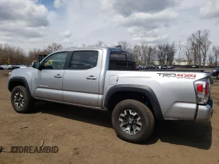 2021 Toyota Tacoma SR z VIN 5TFCZ5AN7MX272231, wystawiony jako Copart lot #52739255 z przebiegiem 67 414 mil mil oraz Szkoda całkowita • Salvage title. Historia ofert i sprzedaży dostępna na DreamBid. Obrazek 2.
