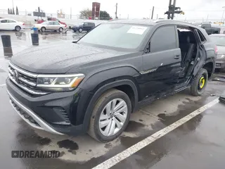 2022 Volkswagen Atlas SE z VIN 1V2WE2CA3NC203707, wystawiony jako IAAI lot #41720912 z przebiegiem 50 572 mil mil oraz . Historia ofert i sprzedaży dostępna na DreamBid. Obrazek 18.