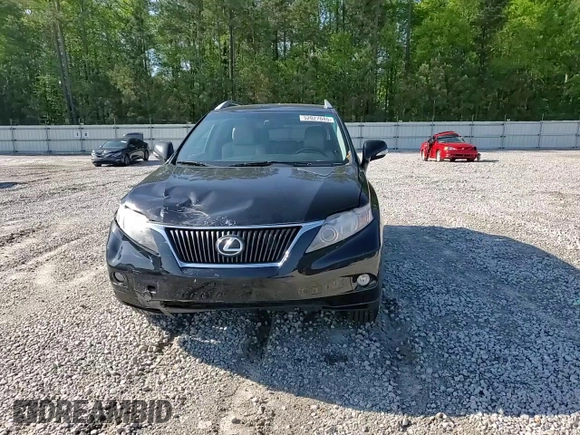 2011 Lexus RX 350 with VIN 2T2BK1BAXBC091801, listed as a Copart auction lot 52027045 with 185,562 mi miles and Salvage Title. Bid and sale history available at DreamBid. Image 12.