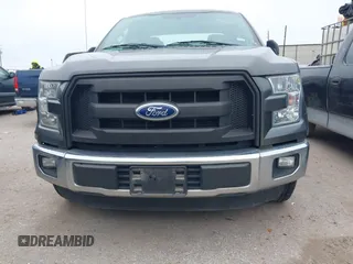 2015 Ford F-150 XL with VIN 1FTEX1CF6FKF02242, listed as a IAAI auction lot 41478528 with 144,197 mi miles. Bid and sale history available at carsss.com. Image 6.
