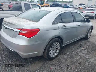 2011 Chrysler 200 Touring with VIN 1C3BC1FB1BN522001, listed as a IAAI auction lot 42104849 with 174,021 mi miles and . Bid and sale history available at DreamBid. Image 4.