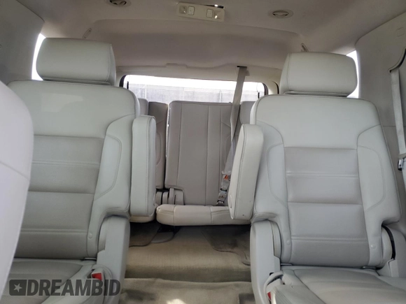2015 GMC Yukon Denali with VIN 1GKS1CKJ1FR303049, listed as a Copart auction lot 82435514 with 100,693 mi miles and Salvage Title. Bid and sale history available at carsss.com. Image 10.