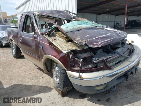 2000 Ford F-150 XL with VIN 1FTRX18L2YNB87229, listed as a IAAI auction lot 42041368 with 84,956 mi miles. Bid and sale history available at carsss.com. Image 1.