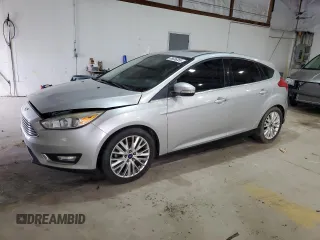 2018 Ford Focus Titanium z VIN 1FADP3N22JL240519, wystawiony jako Copart lot #55636355 z przebiegiem 143 917 mil mil oraz Czysty tytuł • Clean title. Historia ofert i sprzedaży dostępna na DreamBid. Obrazek 1.