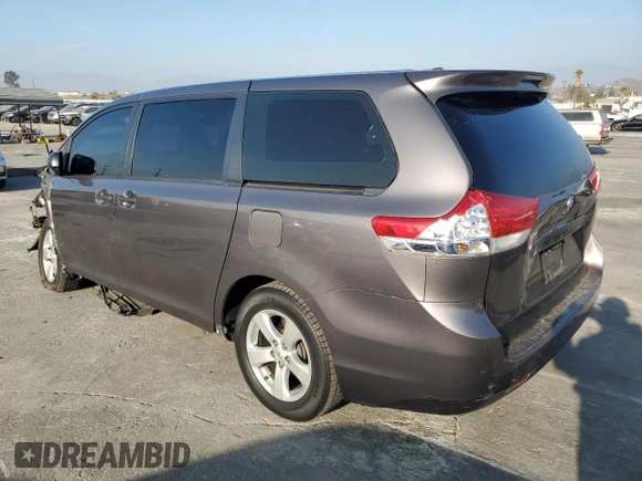 2012 Toyota Sienna with VIN 5TDKA3DC6CS010187, listed as a Copart auction lot 86885234 with 145,745 mi miles and Salvage Title. Bid and sale history available at DreamBid. Image 2.