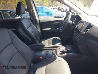 2021 Honda Pilot EX-L with VIN 5FNYF6H59MB016354, listed as a IAAI auction lot 42108020 with 61,436 mi miles and . Bid and sale history available at DreamBid. Image 5.