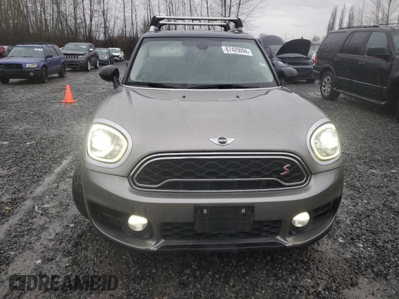 2017 MINI Countryman Cooper S with VIN WMZYT5C33H3D80073, listed as a Copart auction lot 87429094 with 83,566 mi miles and Salvage title. Bid and sale history available at DreamBid. Image 5.