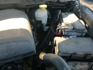 2018 Ram 1500 Tradesman z VIN 1C6RR6FG9JS229598, wystawiony jako Copart lot #70298915 z przebiegiem 99 942 mil mil oraz Szkoda całkowita • Salvage title. Historia ofert i sprzedaży dostępna na DreamBid. Obrazek 13.