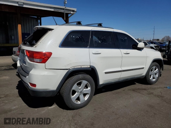 2011 Jeep Grand Cherokee Laredo with VIN 1J4RR4GG3BC671780, listed as a Copart auction lot 49179835 with 166,521 mi miles and Salvage Title. Bid and sale history available at carsss.com. Image 3.