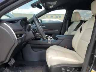 2021 Cadillac XT4 AWD Sport with VIN 1GYFZFR43MF054379, listed as a Copart auction lot 55338315 with 53,693 mi miles and Salvage title. Bid and sale history available at DreamBid. Image 7.