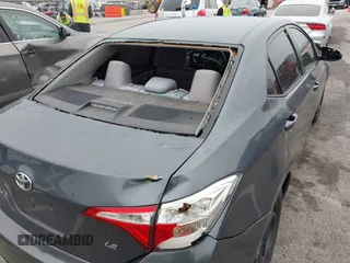 2016 Toyota Corolla L z VIN 5YFBURHE4GP478701, wystawiony jako IAAI lot #41950294 z przebiegiem 117 228 mil mil oraz . Historia ofert i sprzedaży dostępna na DreamBid. Obrazek 6.