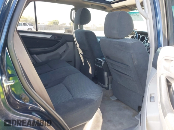 2003 Toyota 4Runner SR5 with VIN JTEZT14R238001097, listed as a IAAI auction lot 41266011 with 180,905 mi miles. Bid and sale history available at carsss.com. Image 8.