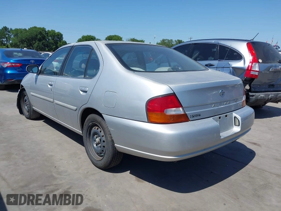 1998 Nissan Altima XE with VIN 1N4DL01D6WC244436, listed as a IAAI auction lot 42002866 with 173,633 mi miles and . Bid and sale history available at carsss.com. Image 3.