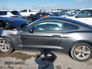 2020 Ford Mustang EcoBoost with VIN 1FA6P8TH3L5169920, listed as a IAAI auction lot 42339107 with 84,748 mi miles and . Bid and sale history available at DreamBid. Image 14.