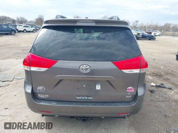 2014 Toyota Sienna XLE with VIN 5TDYK3DC4ES463315, listed as a IAAI auction lot 42108050 with 197,140 mi miles. Bid and sale history available at carsss.com. Image 16.