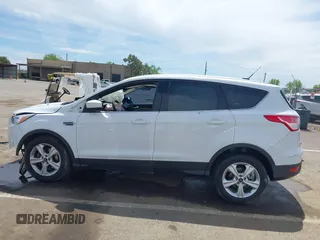 2014 Ford Escape SE with VIN 1FMCU0GX7EUC85585, listed as a IAAI auction lot 42022444 with 161,352 mi miles and . Bid and sale history available at DreamBid. Image 14.