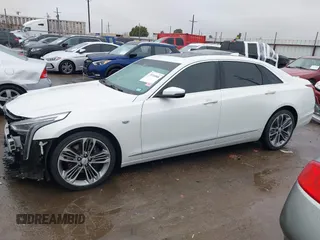 2019 Cadillac CT6 Luxury AWD z VIN 1G6KB5RS9KU114954, wystawiony jako IAAI lot #38260808 z przebiegiem 17 666 mil mil oraz . Historia ofert i sprzedaży dostępna na DreamBid. Obrazek 15.